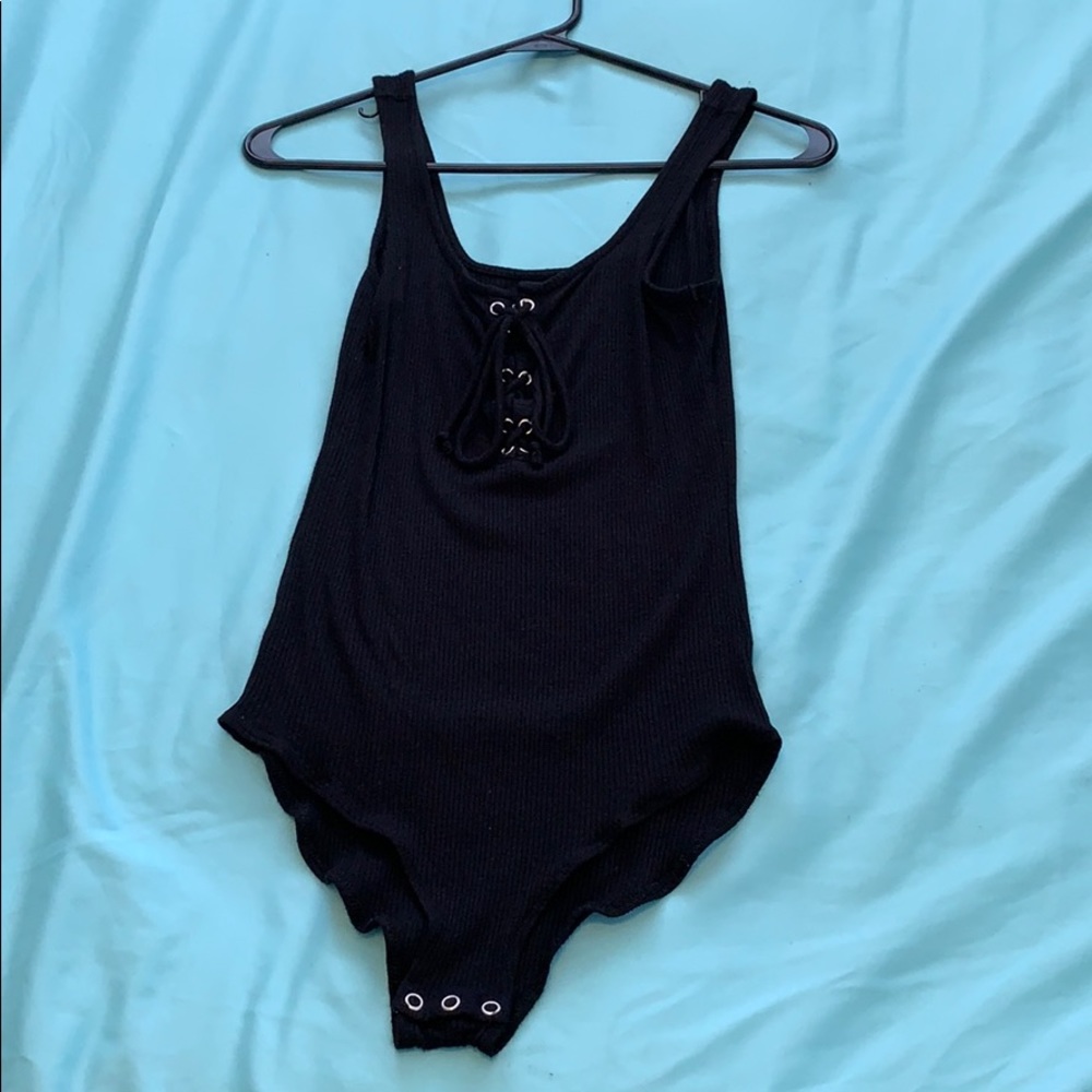 a black AMERICAN EAGLE body suit